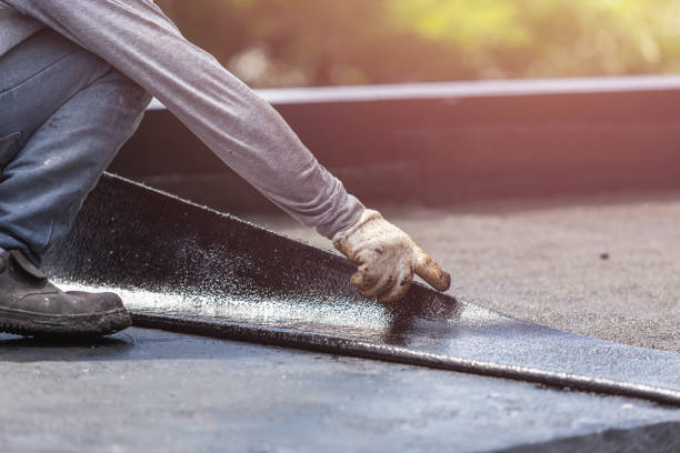 Professional Basement Waterproofing technician working in Derby, OH